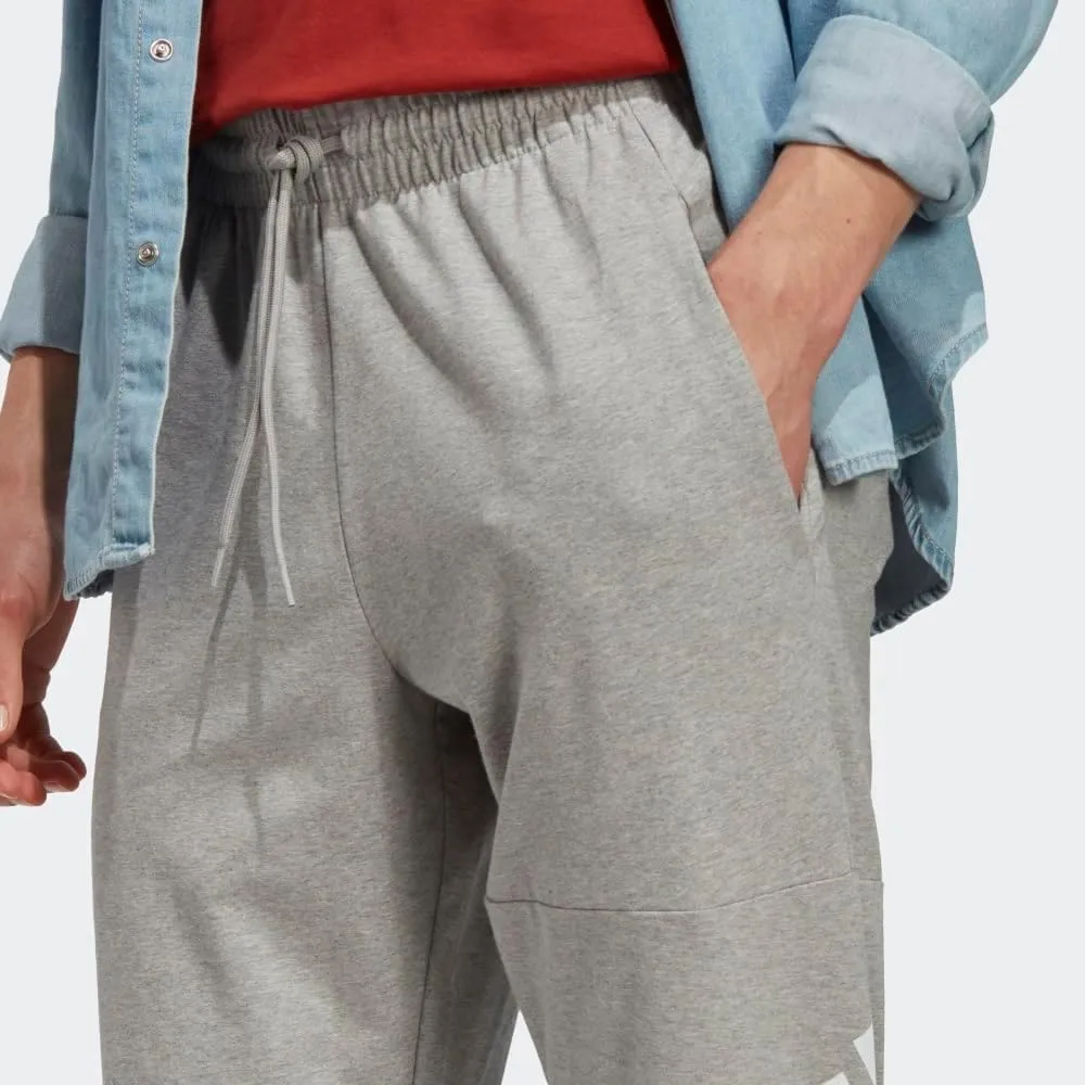 adidas Mens Essentials Logo Tapered Badge Sweatpants Training Casual - Black
